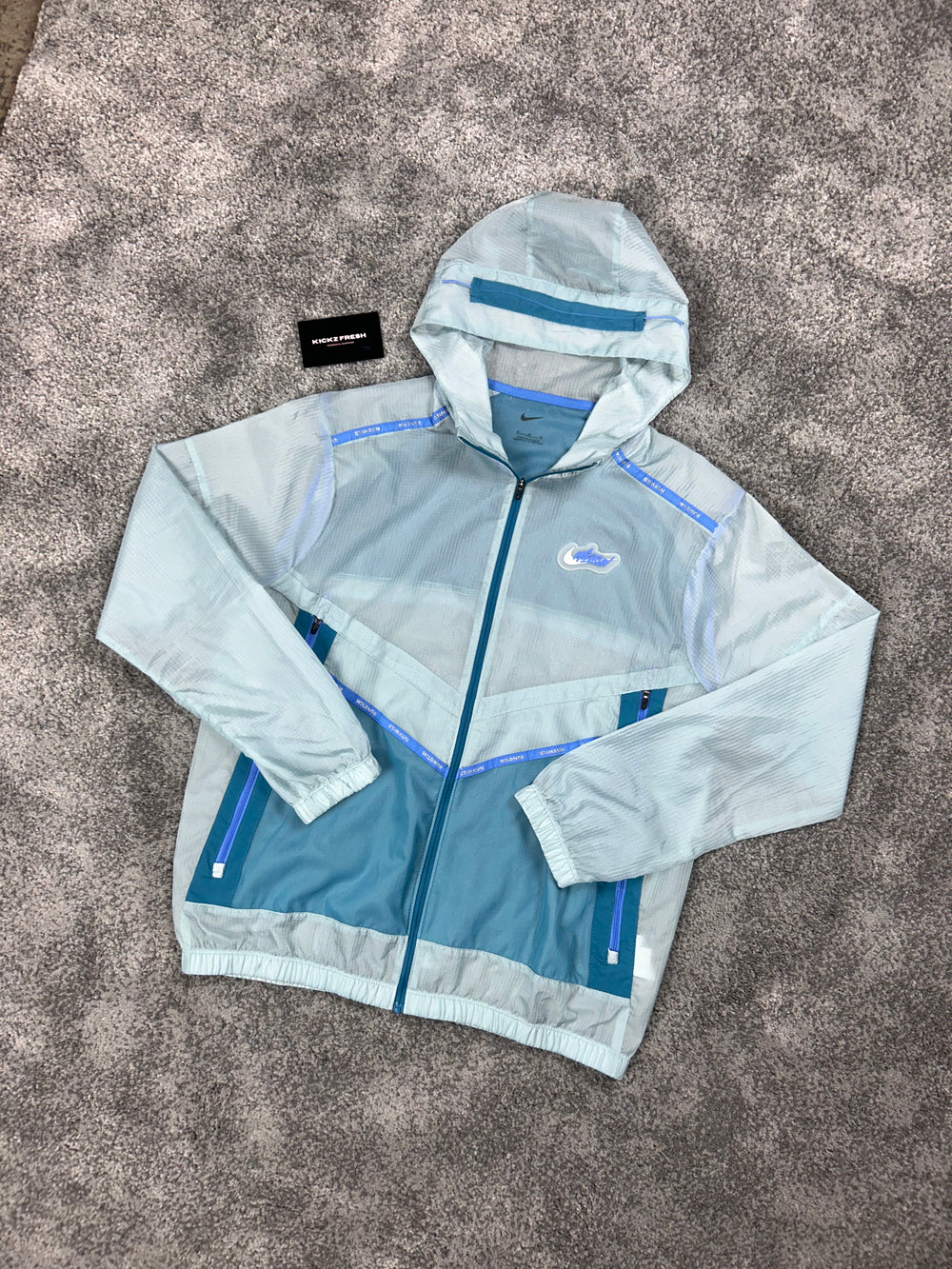 NIKE WINDRUNNER WILDRUN JACKE „EISBLAU“