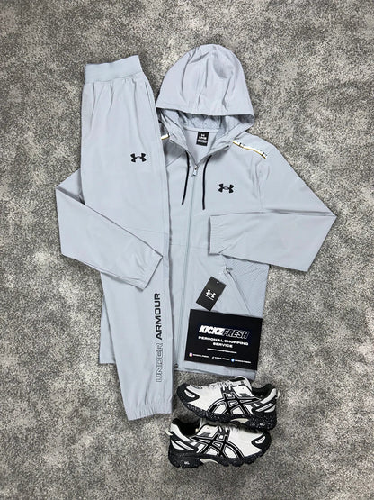 UNDER ARMOUR WOVEN TRAININGANZUG HELLGRAU