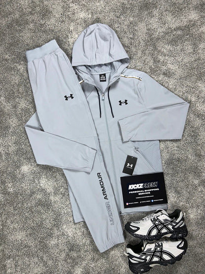 UNDER ARMOUR WOVEN TRAININGANZUG HELLGRAU